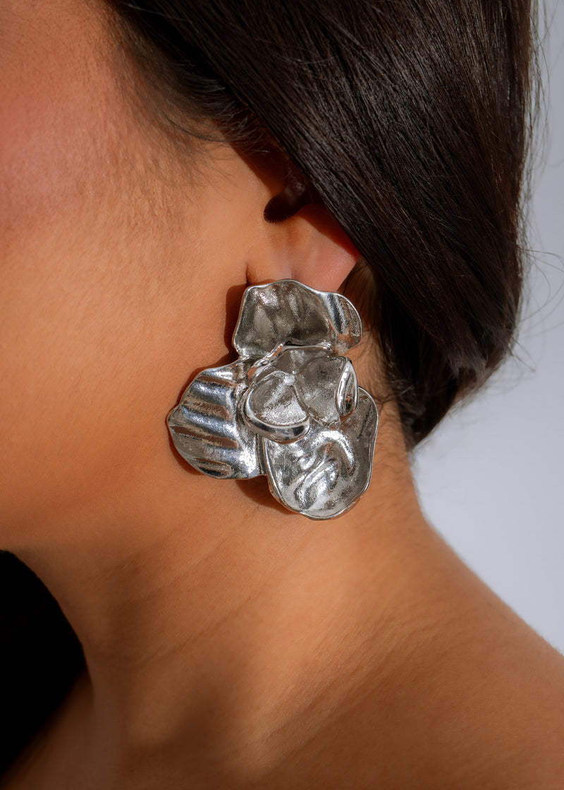 Shimmering silver Liquid Bloom Earrings with delicate floral design and intricate detailing