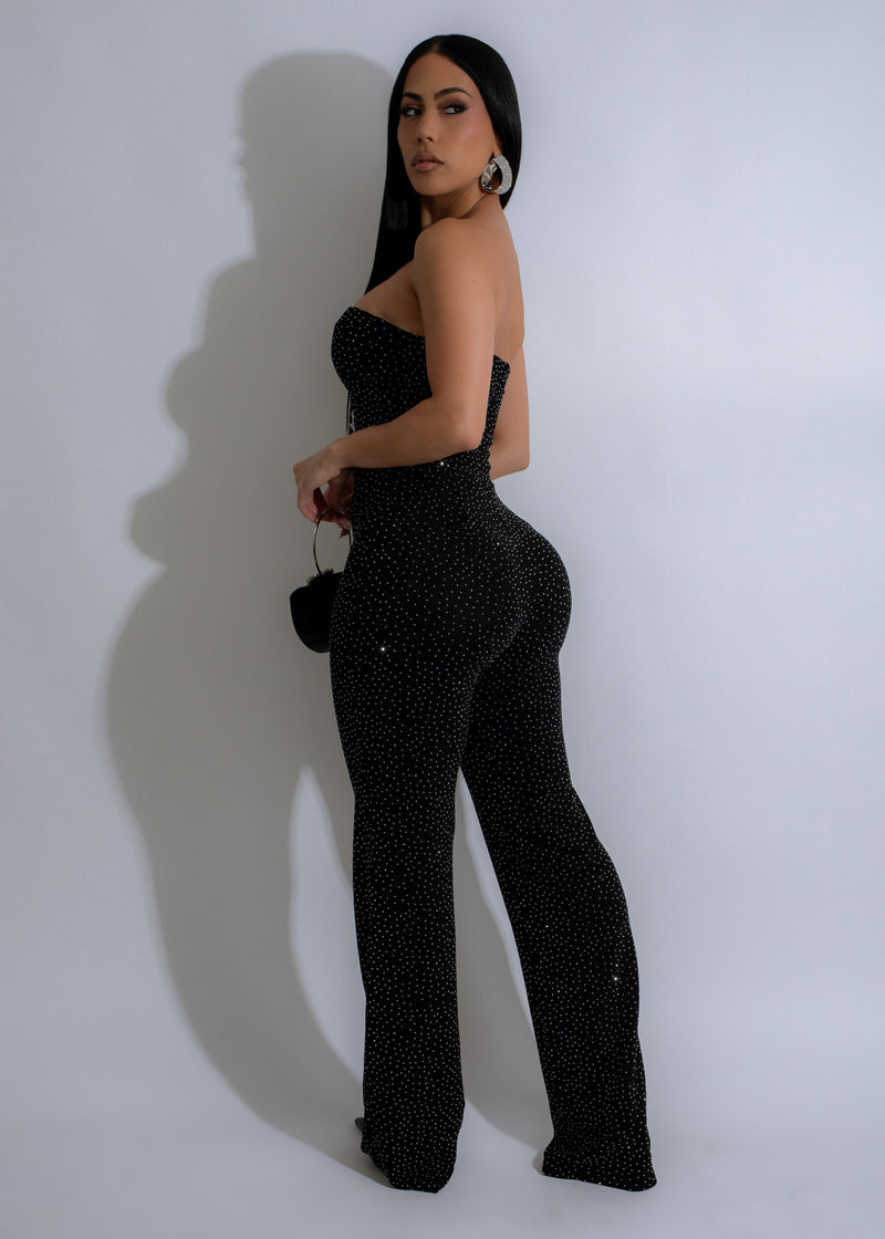  Full-length view of black rhinestone jumpsuit with elegant design and shimmering embellishments