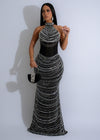 Close-up of Cosmic Symphony Rhinestones Mesh Maxi Dress Black with intricate rhinestone detailing and flowing black fabric