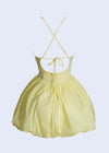  Beautiful yellow babydoll mini dress with a soft lilac hue and elegant design, ideal for a sunny day outing