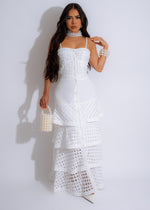 Beautiful white maxi dress with angelic energy and flowing silhouette, perfect for special occasions and events