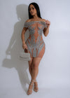 Shimmering silver mini dress with rhinestone mesh detailing and star beam design 