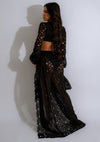 Black lace skirt set with matching crop top, perfect for evening wear