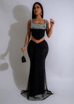 Black skirt set with rhinestone embellishments and ruched details for a celestial, glimmering look