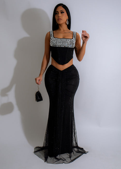 Black skirt set with rhinestone embellishments and ruched details for a celestial, glimmering look