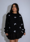 Ribbon Charm Knit Sweater Black* with intricate ribbon design and cozy knit texture