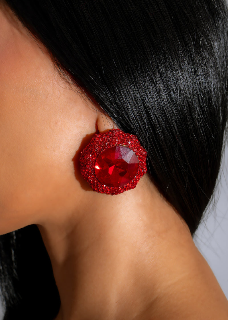 Beautiful radiant gemstone earrings in vibrant red color, perfect for adding a touch of elegance to any outfit