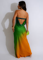 Flowy and elegant Tropical Sunset Maxi Dress Green in a vibrant green color