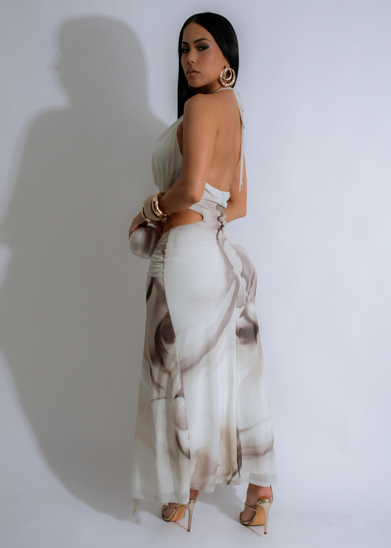 Alt text: Beautiful nude midi dress with an ember glow, perfect for a formal event or evening out