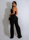  Regal Ascent Jumpsuit Black: This elegant black jumpsuit features a sleek and modern design, with a cinched waist and wide-leg pants, making it a versatile and sophisticated choice for any event