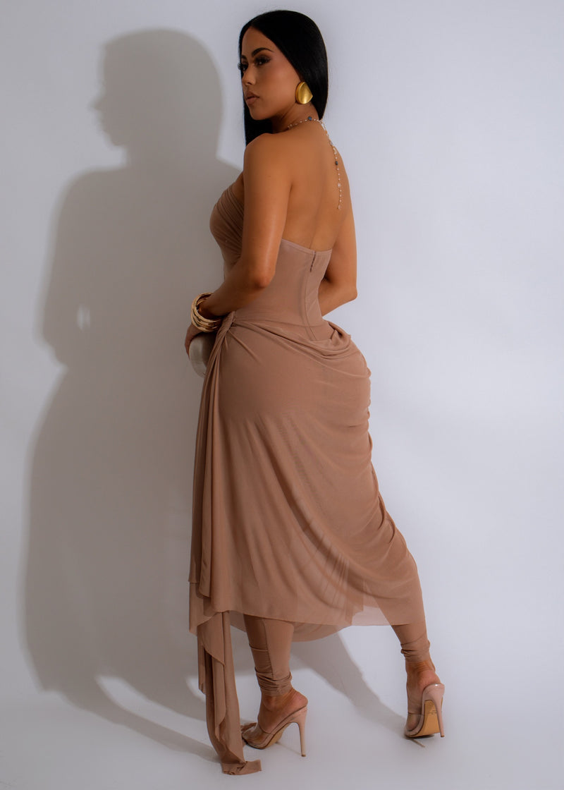 She's Elegance Jumpsuit Nude in a natural outdoor setting, exuding grace and style