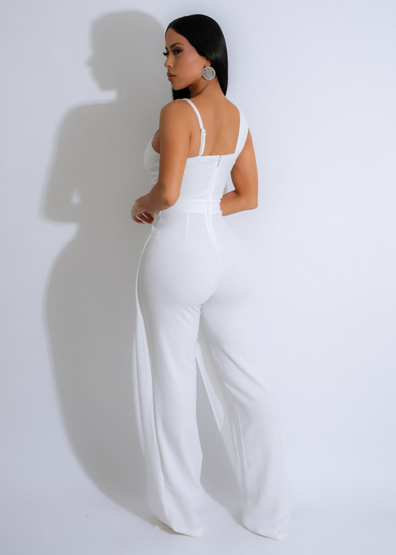  Stunning white jumpsuit adorned with shimmering rhinestones for a glamorous look