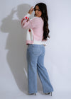 Cozy and soft pink knit sweater with a stylish berry pattern