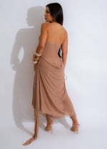 Side view of the She's Elegance Jumpsuit Nude showing off its stylish silhouette