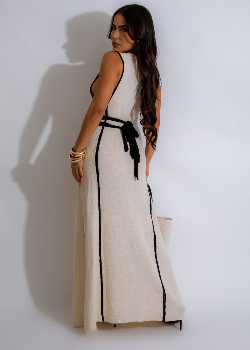 Alt text: The Knotted Back Knit Maxi Dress in a beautiful nude color with a figure-flattering silhouette, perfect for everyday wear or special occasions