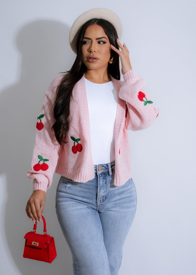 Cherry Delight Knit Sweater Pink, a cozy and stylish sweater perfect for chilly days