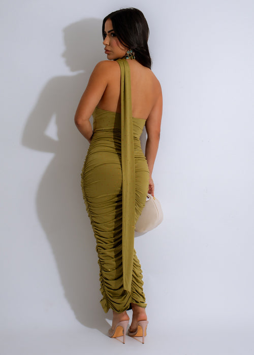 Green maxi dress with ruched detailing, adorned with sparkling galaxy glimmer rhinestones