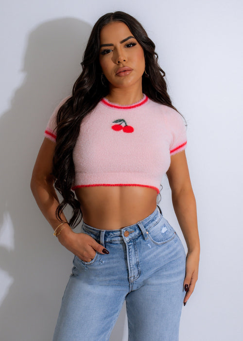 Close up of the Cherry Fuzz Knit Crop Top Pink fabric texture and color