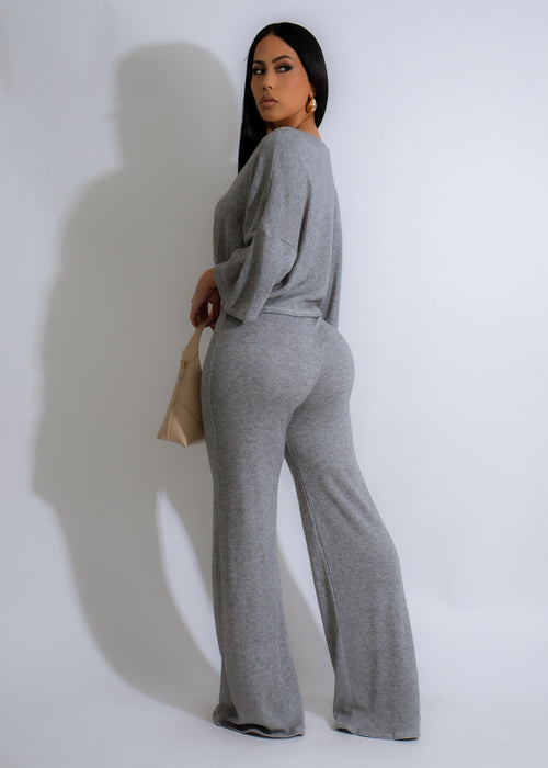  Two-piece lounge set in soft grey fabric featuring a relaxed fit and matching top