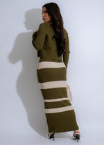 Close-up of the top portion of the Eclipse Current Ribbed Striped Maxi Dress Green showcasing the comfortable and trendy ribbed fabric, ideal for warm weather outings and events