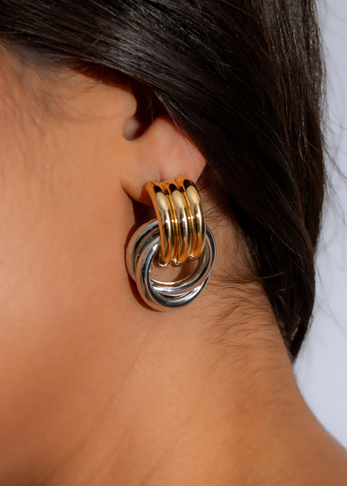 Shiny silver and gold infinity circle earrings, elegant and timeless design