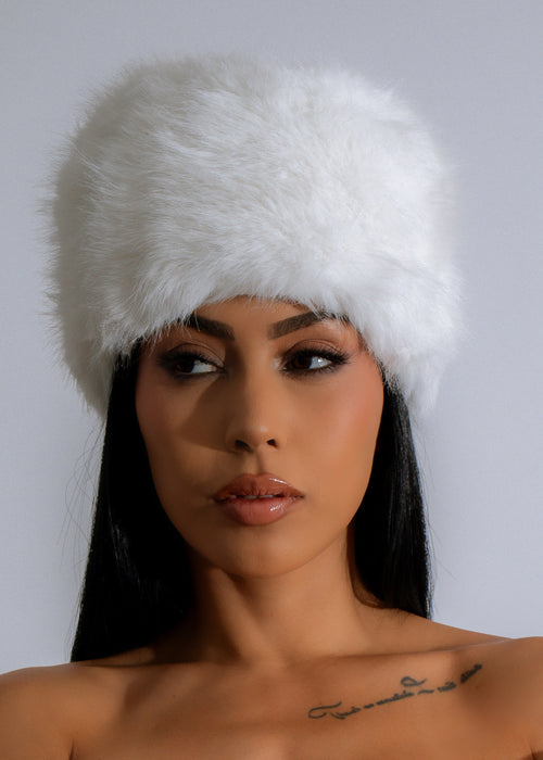 Stay warm and stylish with the Luxe Winter Whisper Faux Fur Hat in elegant white