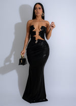 Full-length black metallic maxi dress with ruched detailing and celestial cascade design