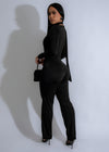 Glamorous and elegant black rhinestone jumpsuit with a figure-hugging silhouette and sparkling embellishments