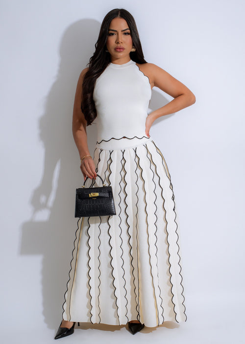 White knit skirt set with a matching crop top and high-waisted skirt for a stylish and versatile outfit option