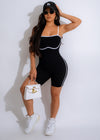 Stylish black romper with a fitted waist and v-neckline for women