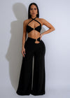 Drape Luxe Pant Set Black, a luxurious and sophisticated outfit for any occasion, featuring a flowy black drape top and matching straight-leg pants with pockets and a comfortable elastic waistband