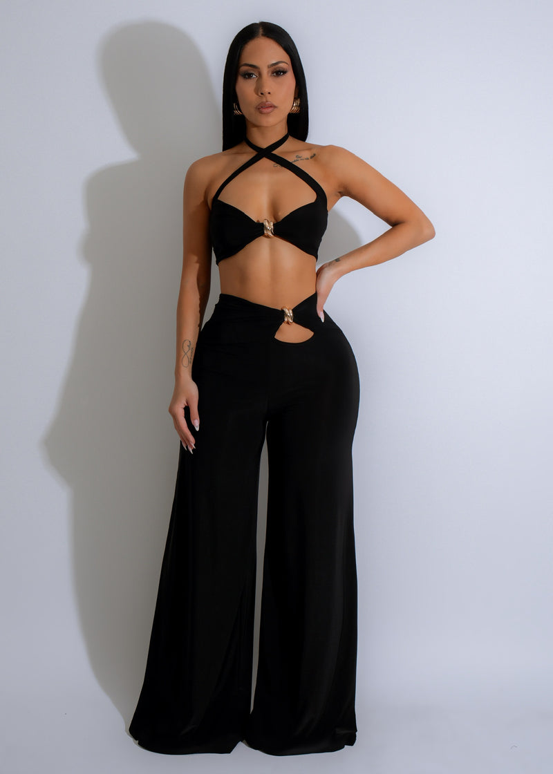 Drape Luxe Pant Set Black, a luxurious and sophisticated outfit for any occasion, featuring a flowy black drape top and matching straight-leg pants with pockets and a comfortable elastic waistband