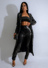 Sleek and stylish black faux leather pant set with serpent design