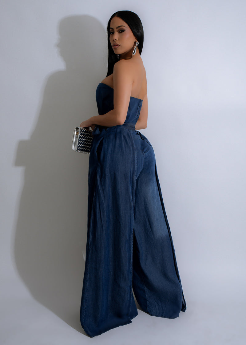 Cerulean Rift Jumpsuit Denim - This trendy jumpsuit features a flattering silhouette and unique cerulean details, making it a must-have for any fashion-forward wardrobe