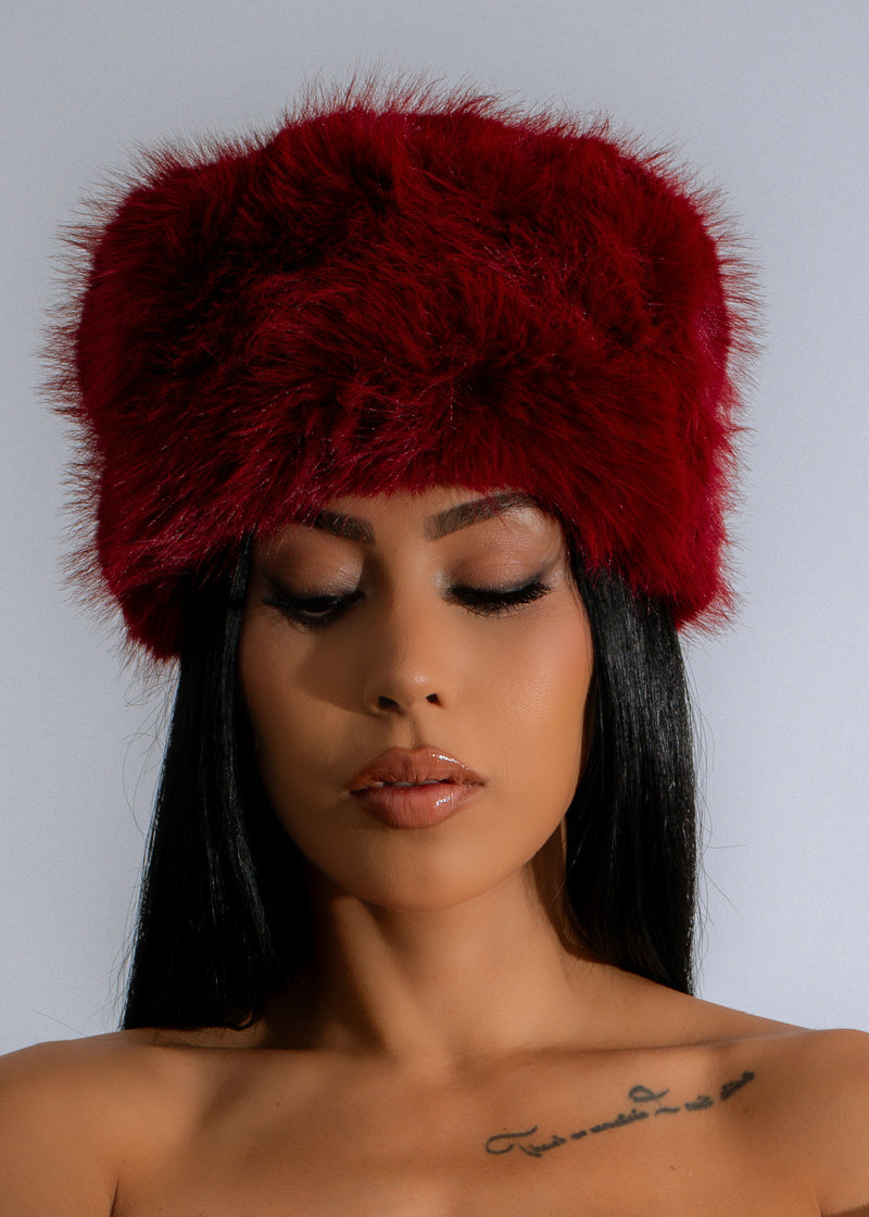 Stay warm and stylish in the Luxe Winter Whisper Faux Fur Hat Red, a luxurious and cozy accessory perfect for the cold season