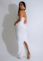  Elegant white dress featuring romantic rose petal pattern and bandage design