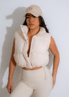 Quilted, sleeveless vest with a soft, nude hue and cloud-like texture