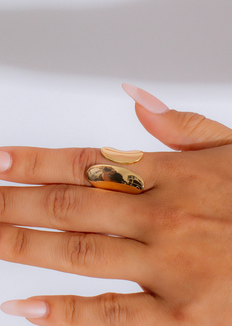 Waveform Band Ring Gold in 14k yellow gold with wavy pattern and smooth finish