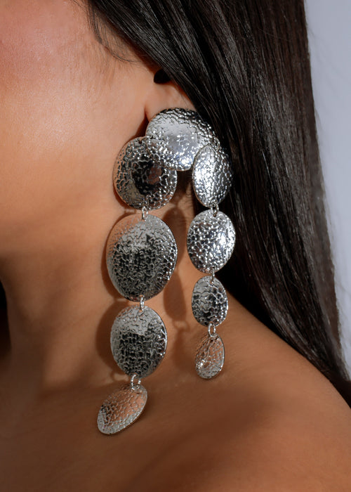 Shimmering silver Molten Moon Earrings, a stunning accessory for any outfit