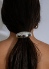 Crescent Glow Hair Tie Silver, a stylish and versatile accessory for any hair type or style 