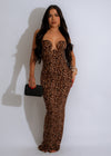 Stunning brown maxi dress with a flowy silhouette and delicate detailing