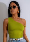 Close up of green twisted harmony ruched crop top on model