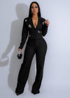 Black rhinestone-studded pant set with a stunning, majestic glow effect