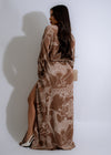  Elegant and versatile Nomad Dream Satin Maxi Dress in Brown, featuring a flattering empire waist and adjustable spaghetti straps