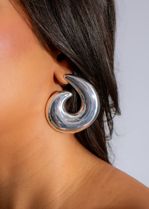 Shiny silver Aurora Swirl Earrings featuring elegant swirling design and intricate details