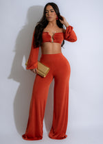 Sunset Serenade Pant Set in vibrant orange color with floral patterns 