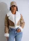 Stylish and trendy nude faux leather jacket with fur detailing