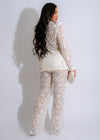 Delicate white lace pant set with luxurious detailing and elegant design