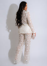 Delicate white lace pant set with luxurious detailing and elegant design