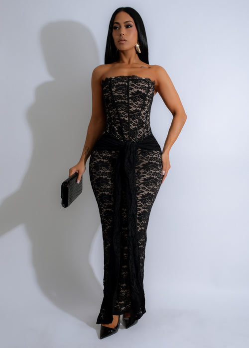 Black lace maxi dress with intricate floral pattern and elegant design